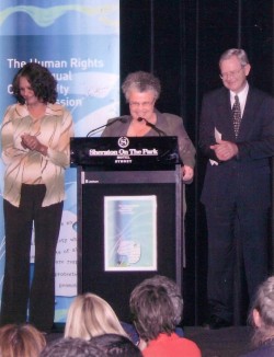 Merinda accepting the 2004 Human Rights Award