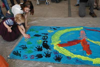 Kids painting a banner